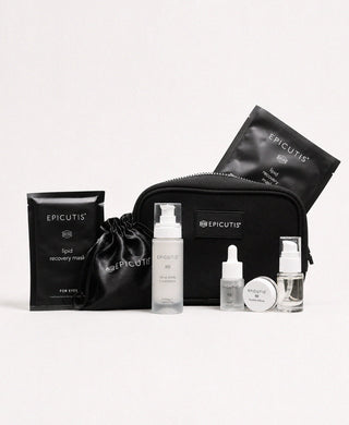 Epicutis Luxury On-The-Go Care Set with skincare bottles, jar, mask packets, and black zippered travel case